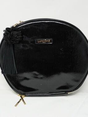 Lancôme Le Parisian Cosmetic Faux Leather Train Case in black. 